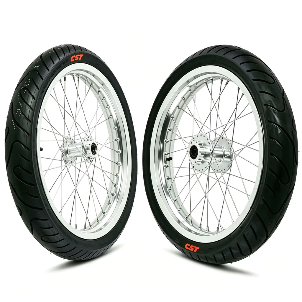 Chrome supermoto wheel and tire pair with silver spokes and hubs