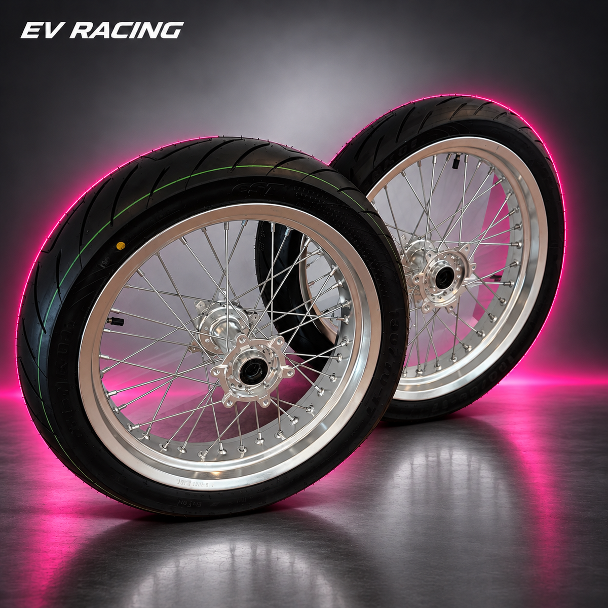 Surron Ultra Bee 17-Inch Supermoto Wheel Set — Chrome on a gray studio background with pink accents