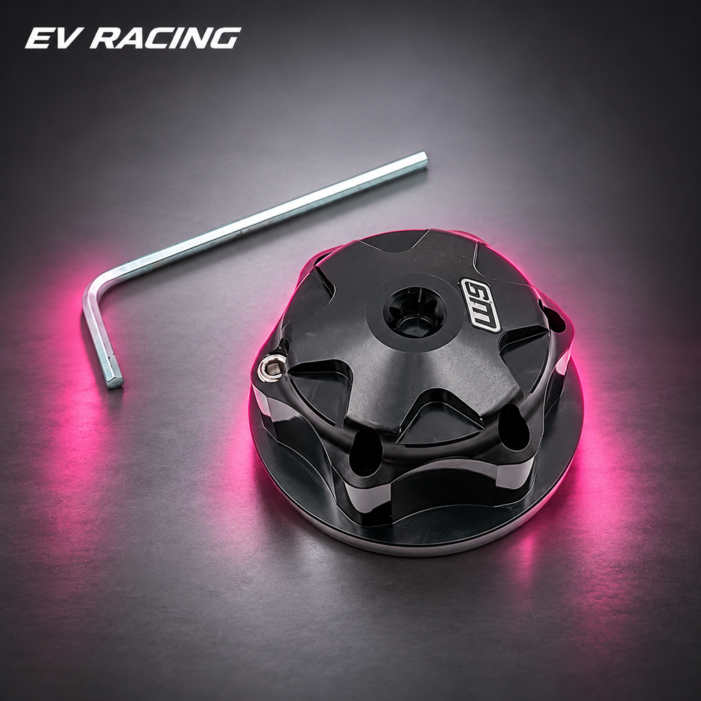 Warp 9 Steering Nut on a gray studio background with pink accents