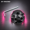 Warp 9 Steering Nut on a gray studio background with pink accents